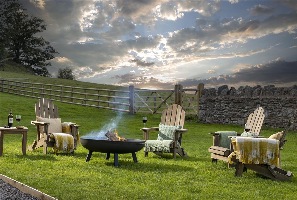 Relax in front of the fire pit at Wormsley Grange and Cottage, Hereford