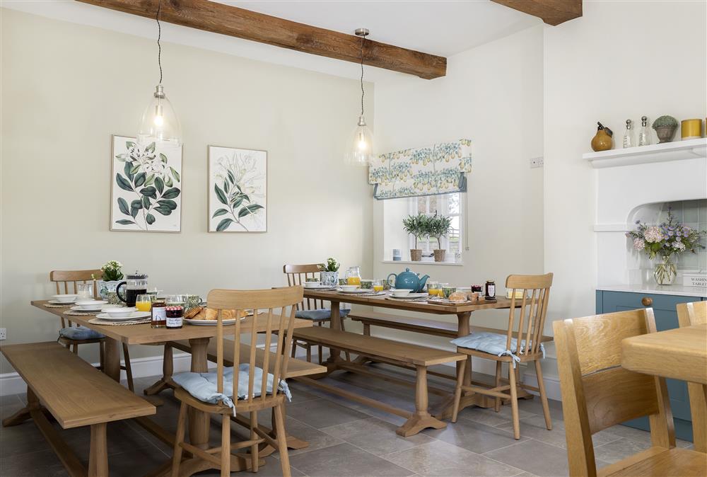 The dining area with beautiful exposed beams at Wormsley Grange and Cottage, Hereford