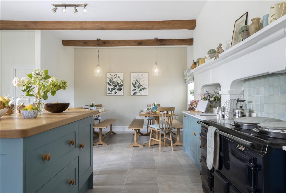 The spacious kitchen has an Aga at Wormsley Grange and Cottage, Hereford