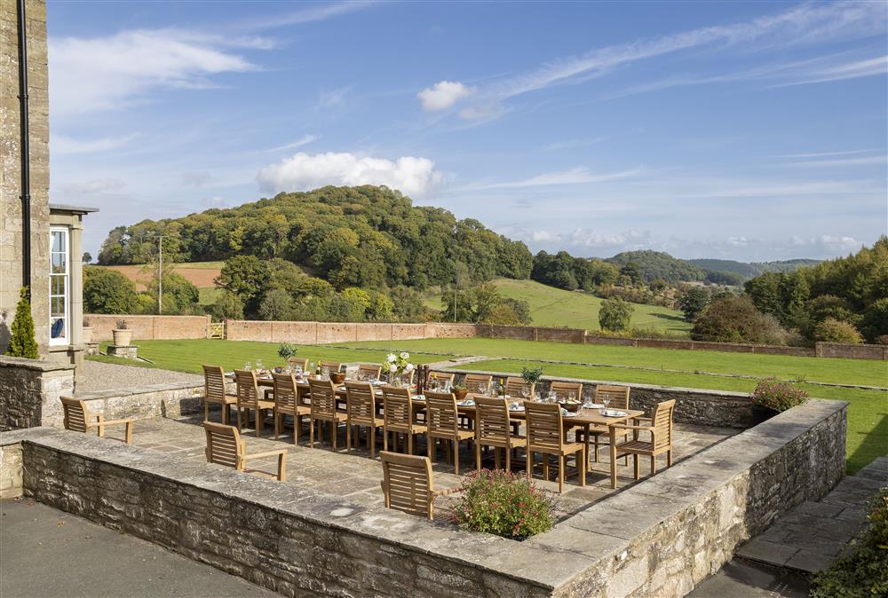 Enjoy an al-fresco meal surrounded by soft landscapes  at Wormsley Grange, Hereford