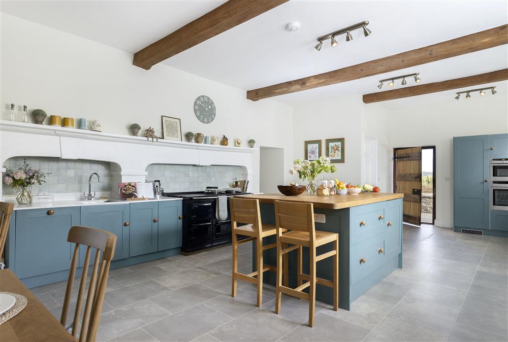 The kitchen boasts a beautiful island at Wormsley Grange, Hereford