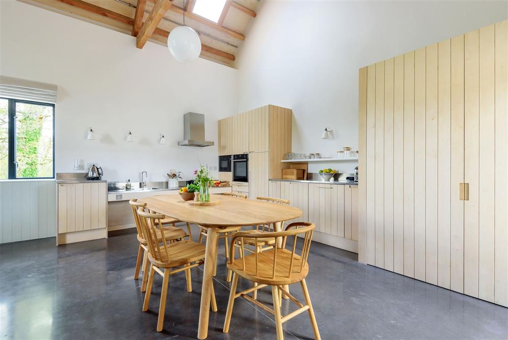 Clementine for four guests, kitchen and dining area enjoying exposed beams above at Wraxall Yard, Dorchester