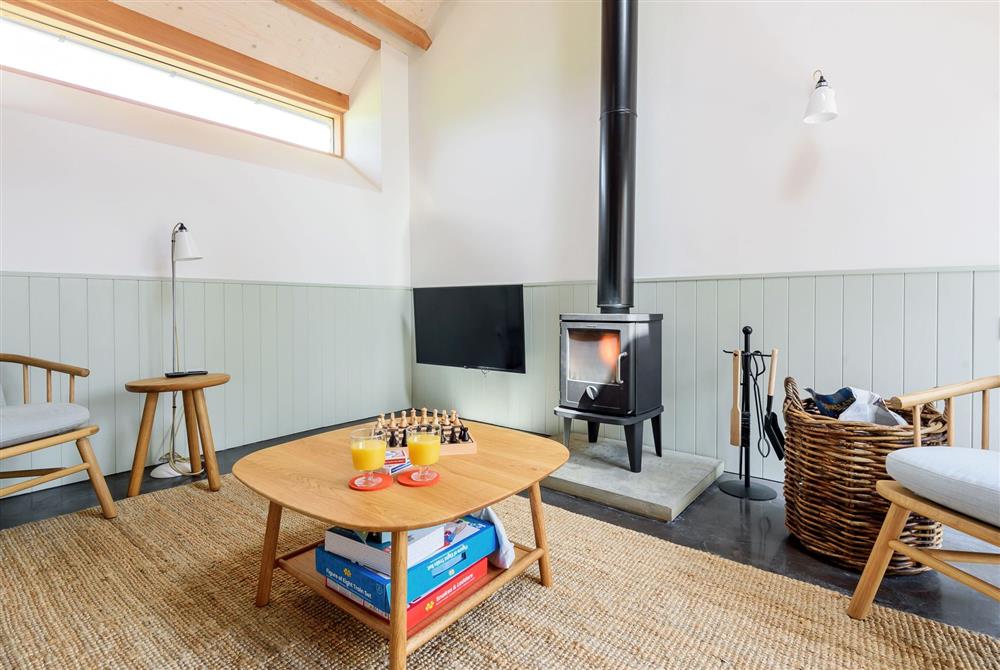 Lynchets for four guests, enjoy cooler evenings around the wood burning stove at Wraxall Yard, Dorchester