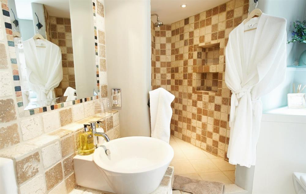 En-suite bathroom with bath, separate power shower and wc at Wreay Mansions, Watermillock