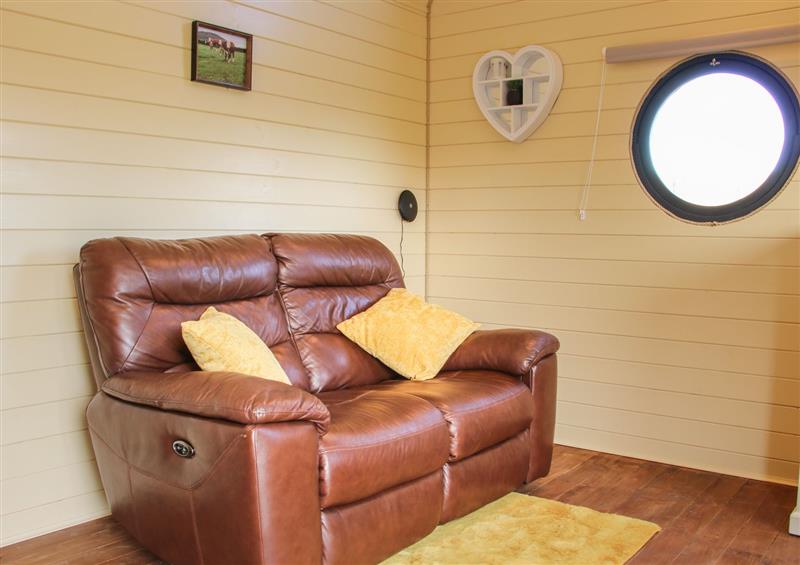 Relax in the living area at Wrekin  Lodge, Much Wenlock