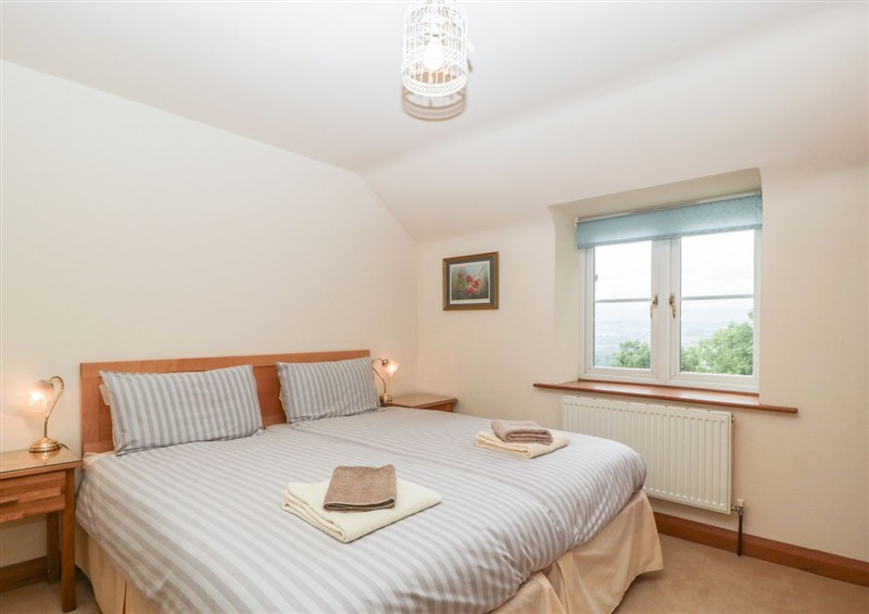 A bedroom in Wren Cottage at Wren Cottage, Goodrich