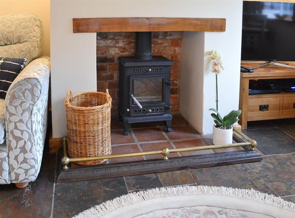 Living room with wood burner (photo 3) at Wren Cottage in Hindringham, near Fakenham, Norfolk