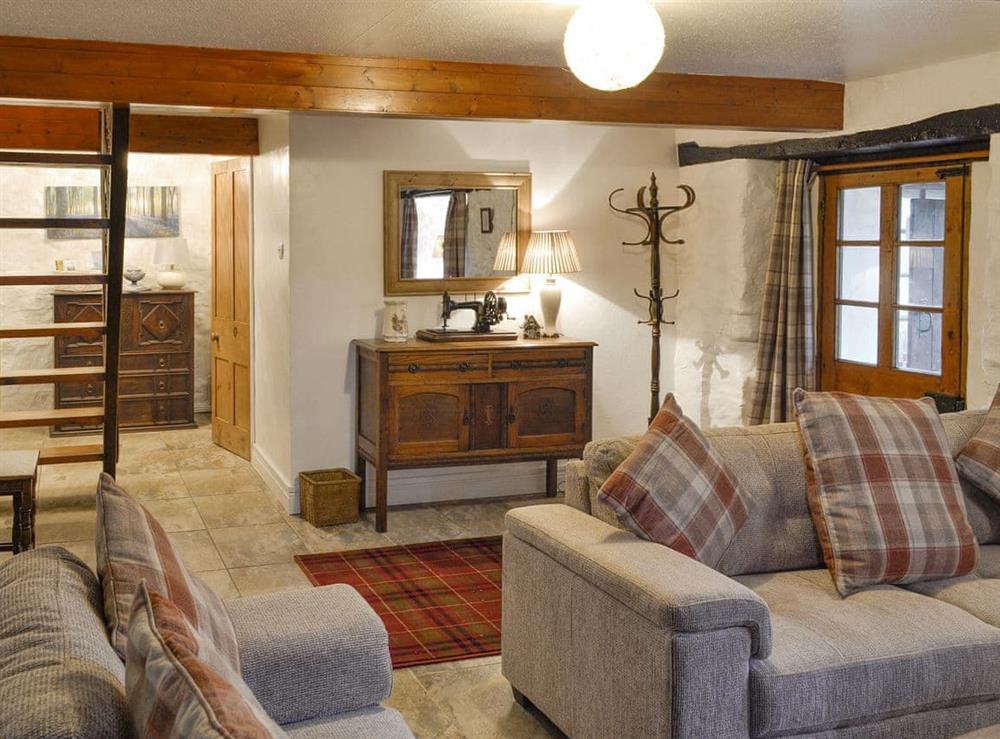 Characterful living room at Wren Cottage in Marian Cwm, near Prestatyn, Denbighshire