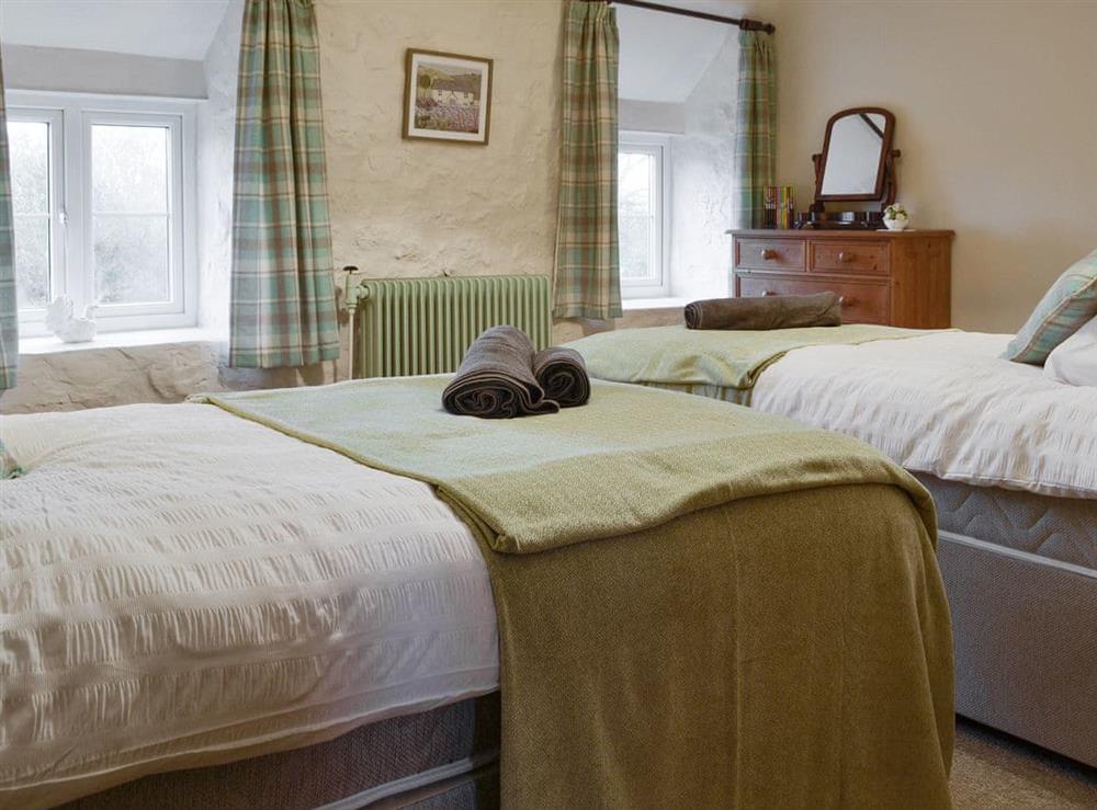 Light and airy twin bedroom at Wren Cottage in Marian Cwm, near Prestatyn, Denbighshire