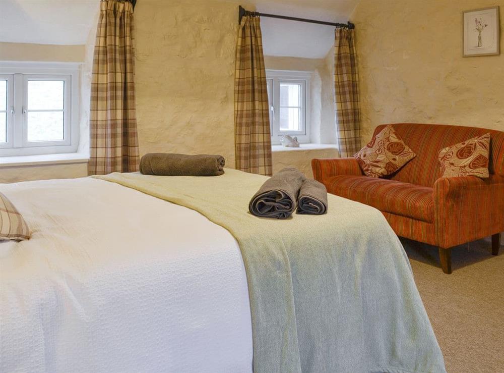 Seating area within second double bedroom at Wren Cottage in Marian Cwm, near Prestatyn, Denbighshire