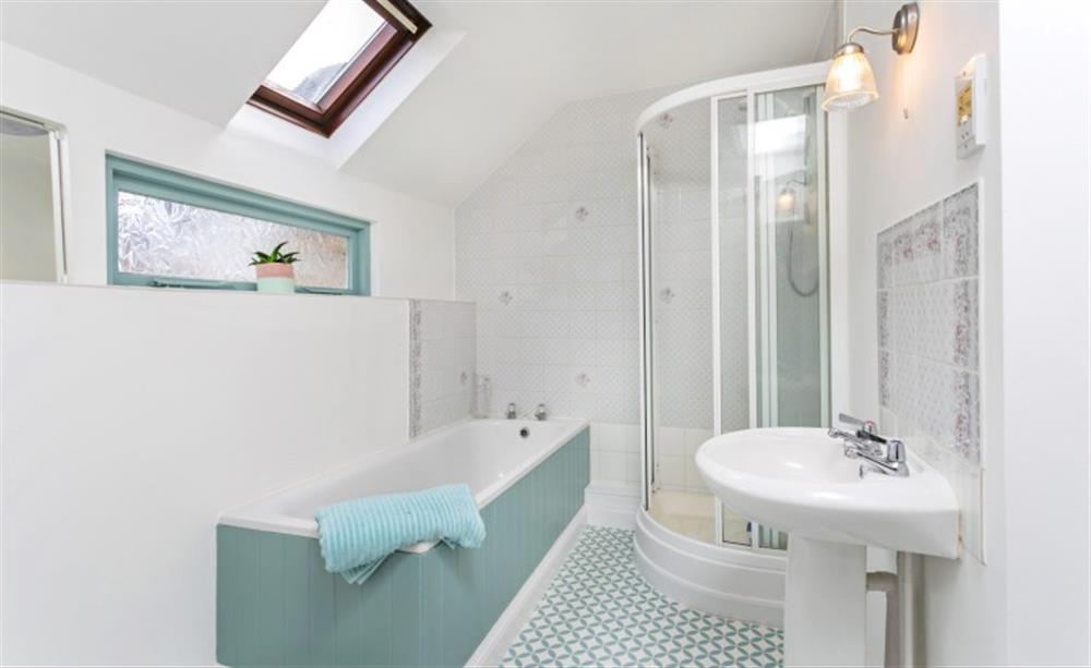 Family Bathroom with Corner shower at Wren Cottage in Netherbury