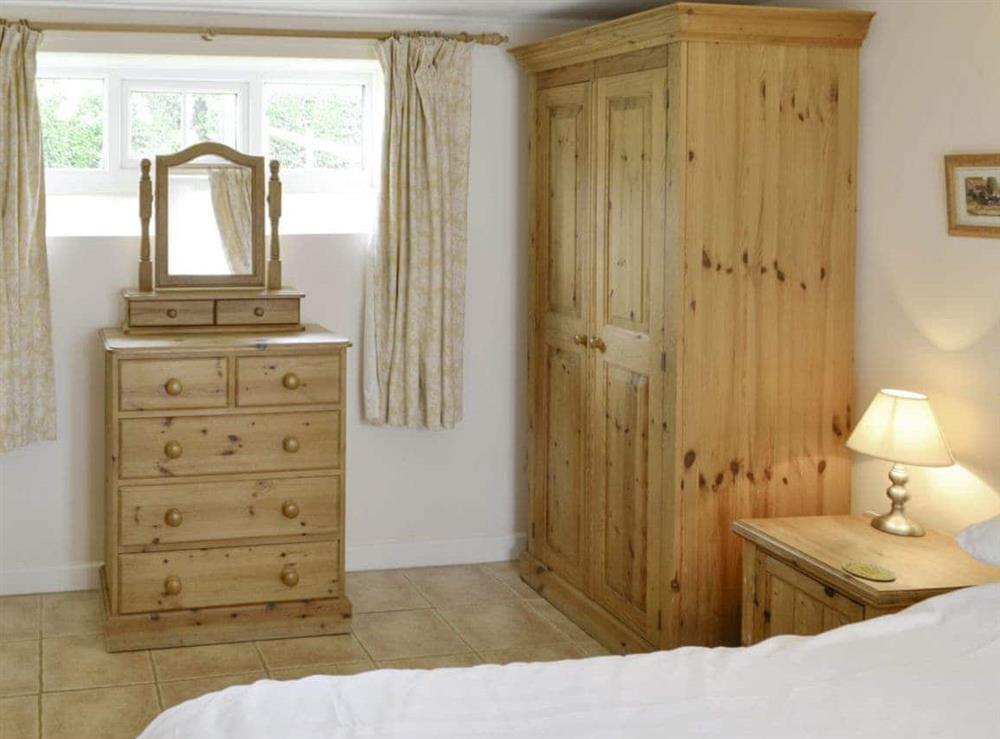Ample storage within double bedroom at Wren Cottage in Salwayash, near Bridport, Dorset