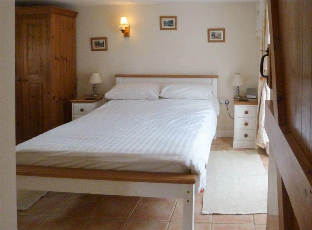 Relaxing double bedroom at Wren Cottage in Salwayash, near Bridport, Dorset