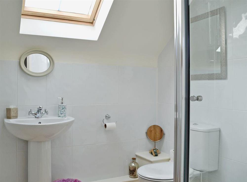 Modern shower room with toilet at The Malthouse, 