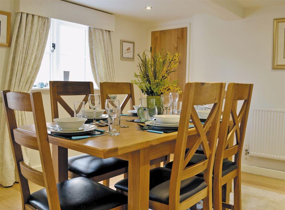 Charming dining area at Wrockwardine Cottage, 