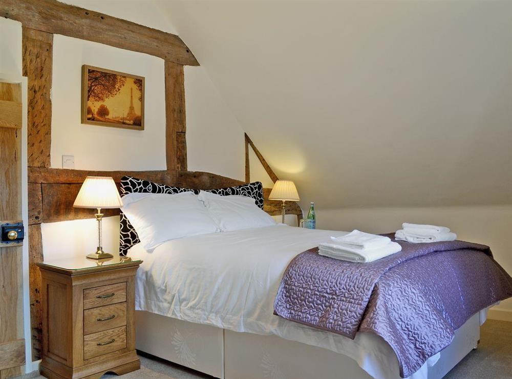 Elegantly designed double bedroom at Wrockwardine Cottage, 