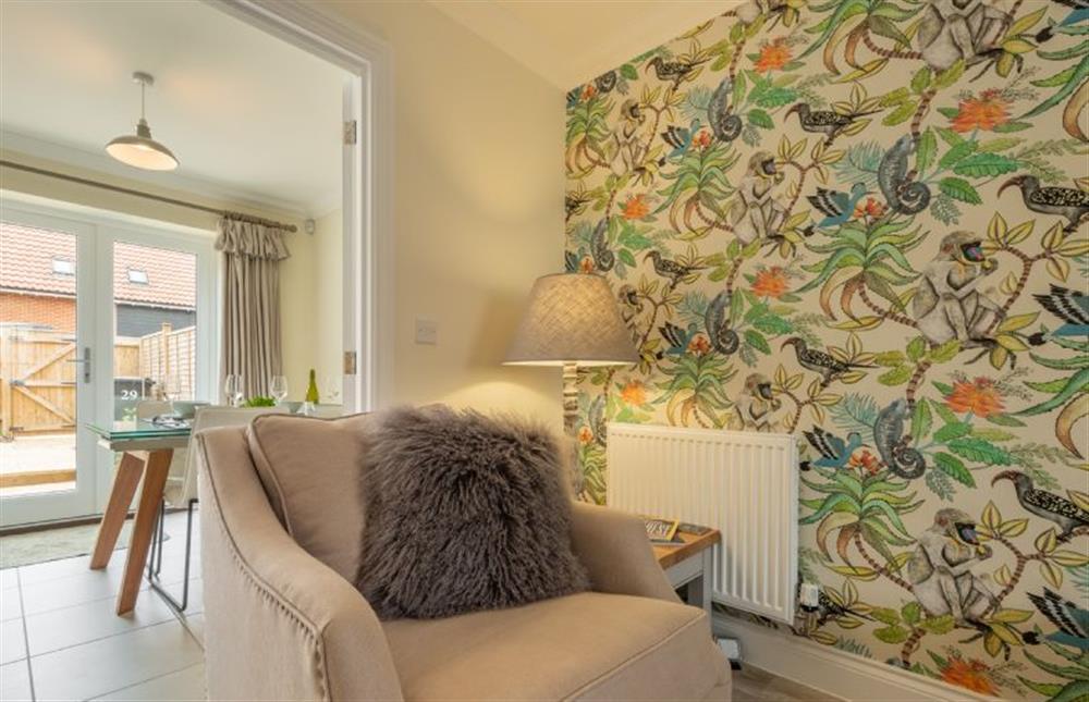 Ground floor: Sitting room with view to dining area at Wye Cottage, Holt