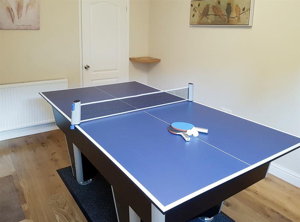 Games room with pool table adapted for table tennis at Wyedale in Bakewell, Derbyshire