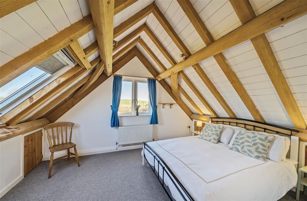 The first floor king-size bedroom with en-suite shower room at Wylye  Croft, Dorchester