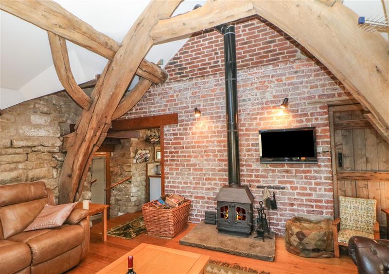 Enjoy the living room at Wyndell Cruck Cottage, Midhopestones near Stocksbridge