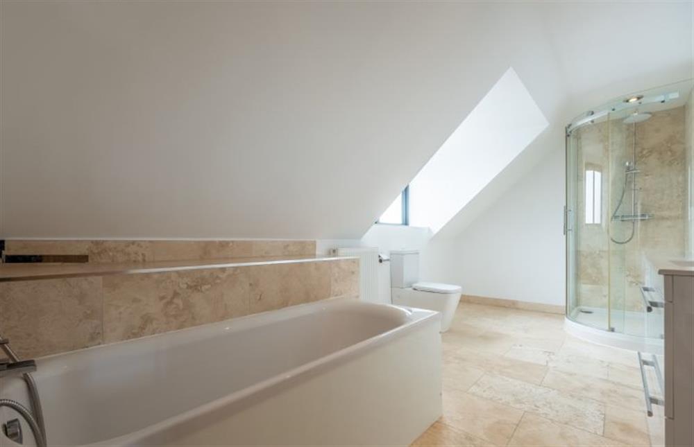 Family bathroom, with bath and walk-in shower at Wynholme, Holme-next-the-Sea