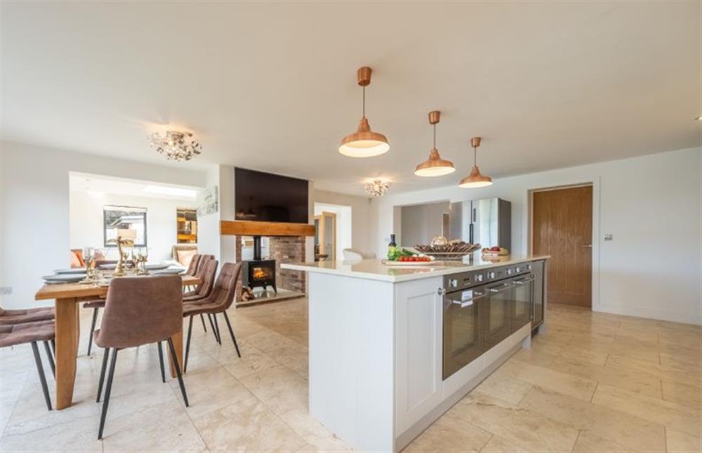 The open-plan kitchen and dining area is bathed in natural light at Wynholme, Holme-next-the-Sea