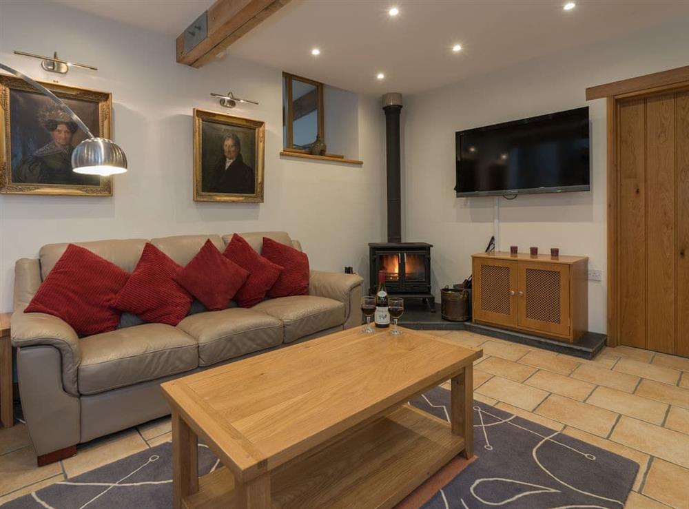 living room with wood burner at Y Beudy in Pwllglas, near Ruthin, Denbighshire