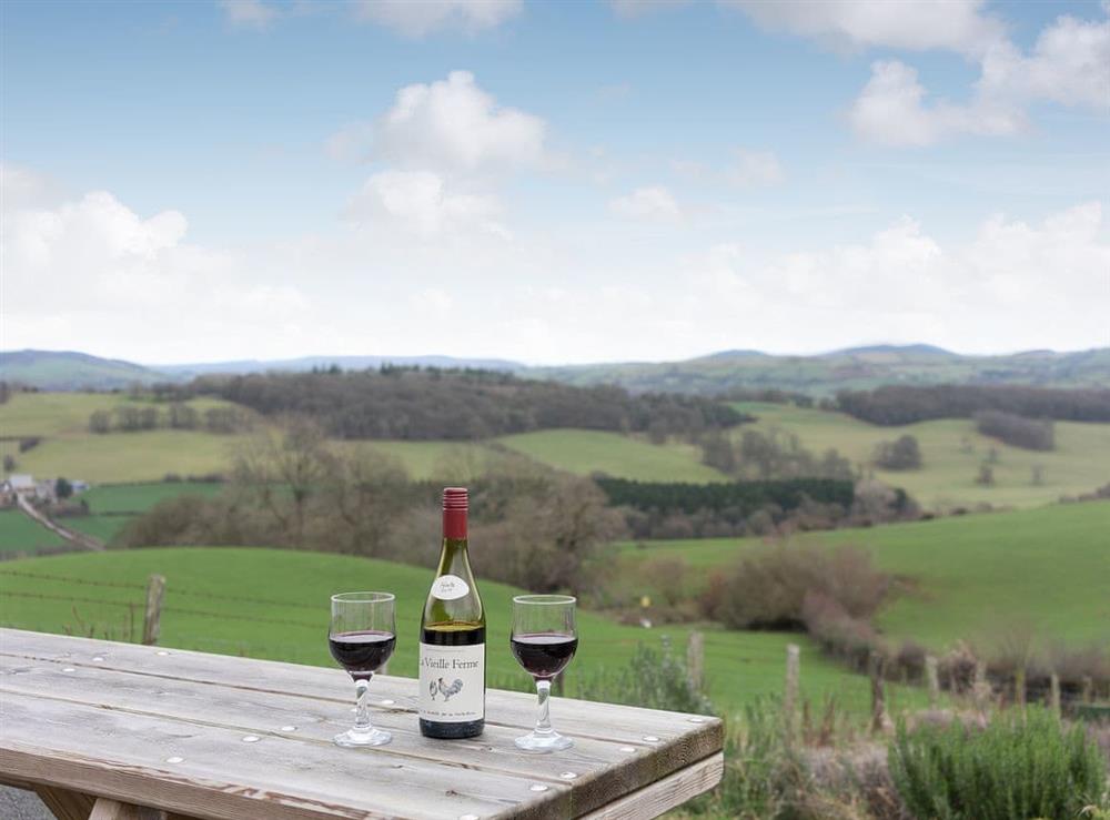 Sitting out area with amazing views at Y Beudy in Pwllglas, near Ruthin, Denbighshire