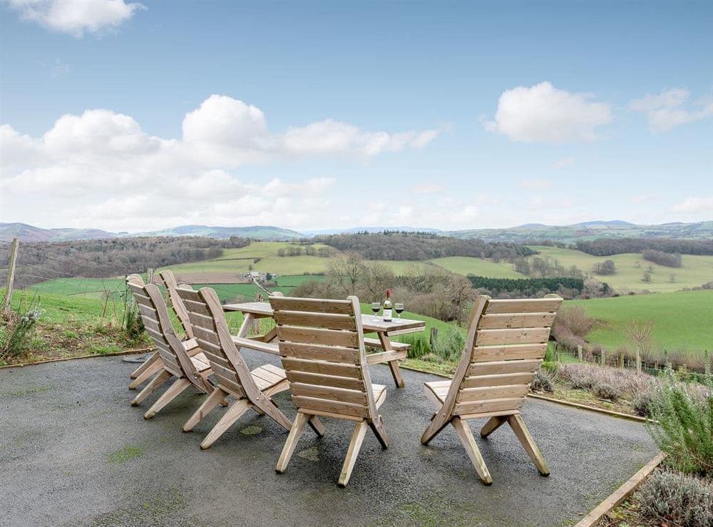 Sitting out area with lovely views at Y Beudy in Pwllglas, near Ruthin, Denbighshire