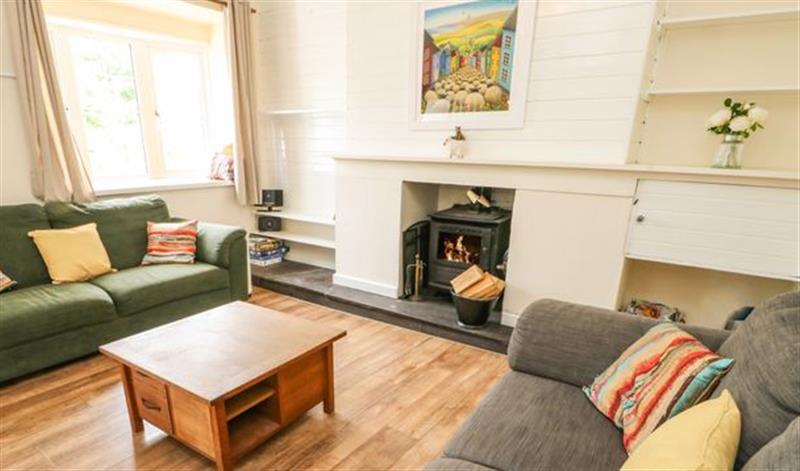 Relax in the living area at Y Bwthyn Bach, Tregarth