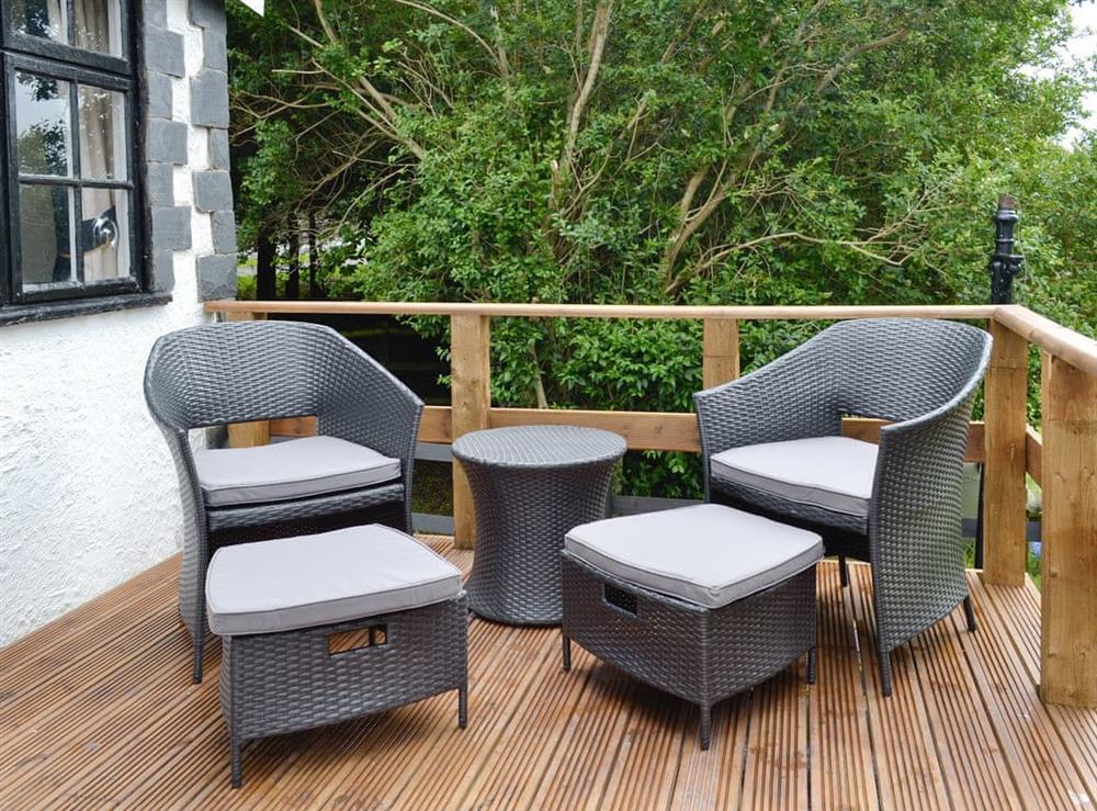 Outdoor furniture on decked balcony/terrace at Y Bwthyn in Bala, Gwynedd