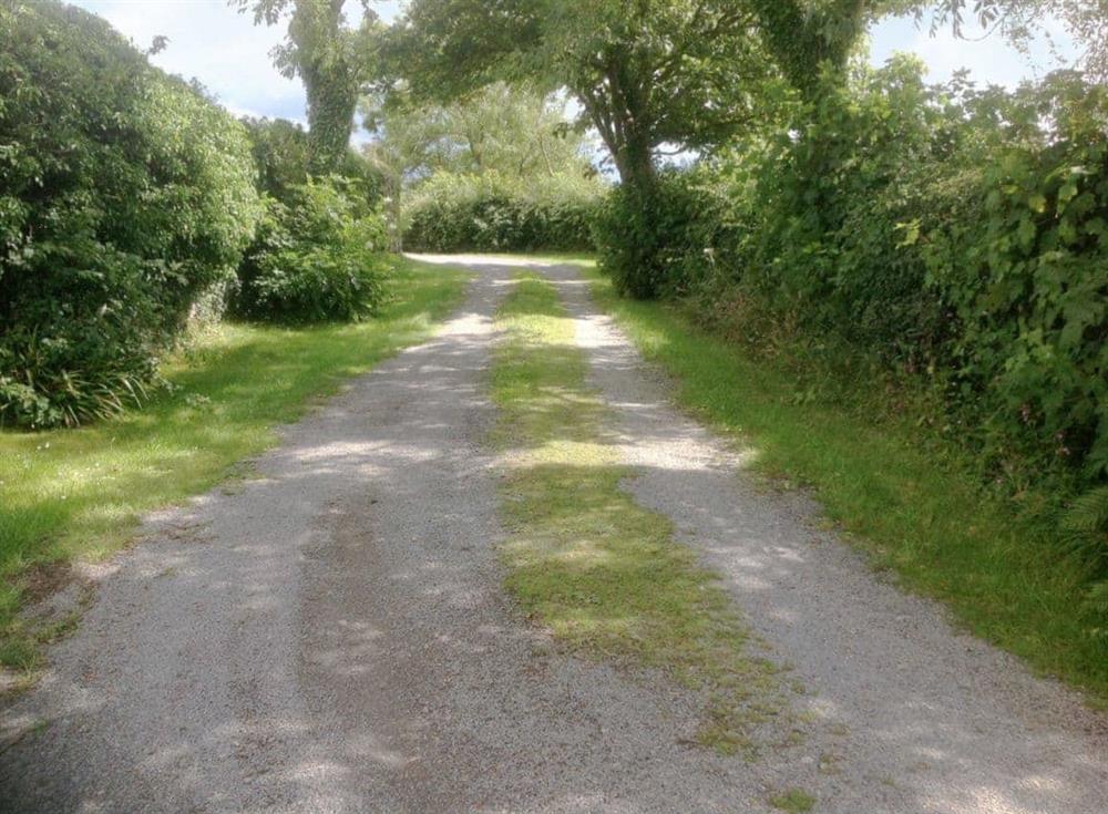 Private lane leading to the cottage at Y Bwythyn in Bodffordd, near Llangefni, Gwynedd