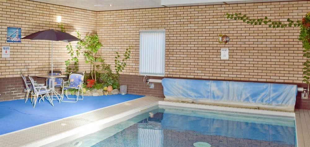 Luxurious heated indoor swimming pool at Y Dorlan in Cardigan, Dyfed