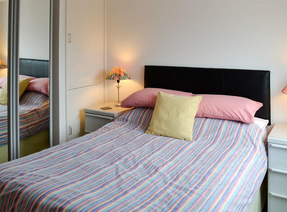Welcoming and romantic double bedroom at Y Fflat Bach in Porthmadog, Gwynedd