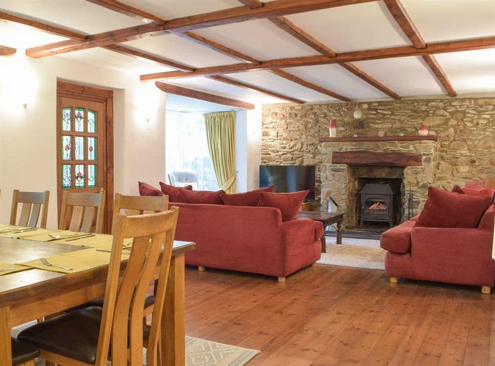 Living room/dining room at Y Gwesty Bach Cottages- Y Gwesty Bach in Castle Morris, Dyfed