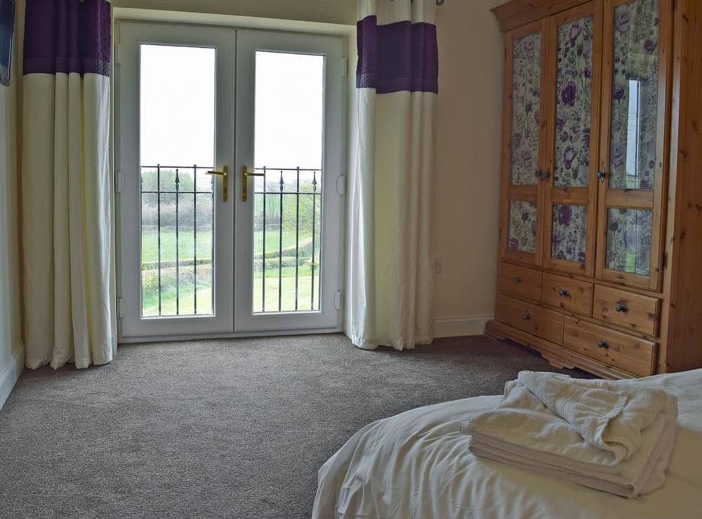 Charming double bedroom (photo 2) at Y Hendy Llaeth in Red Roses, near Whitland, Dyfed