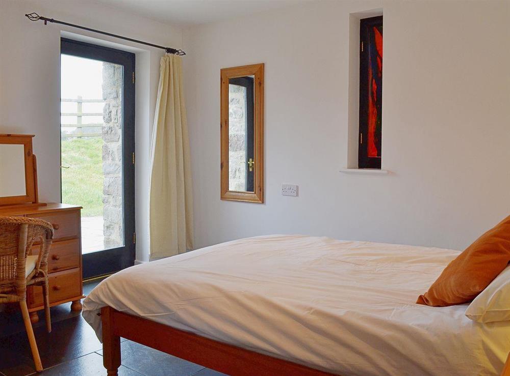 The comfortable and calming double bedroom at Y Stabl in Bethlehem, Carmarthenshire
