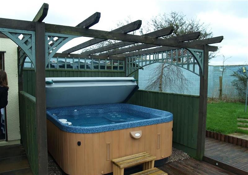 The outdoor hot tub at Y Stabl, Fishguard, Dyfed