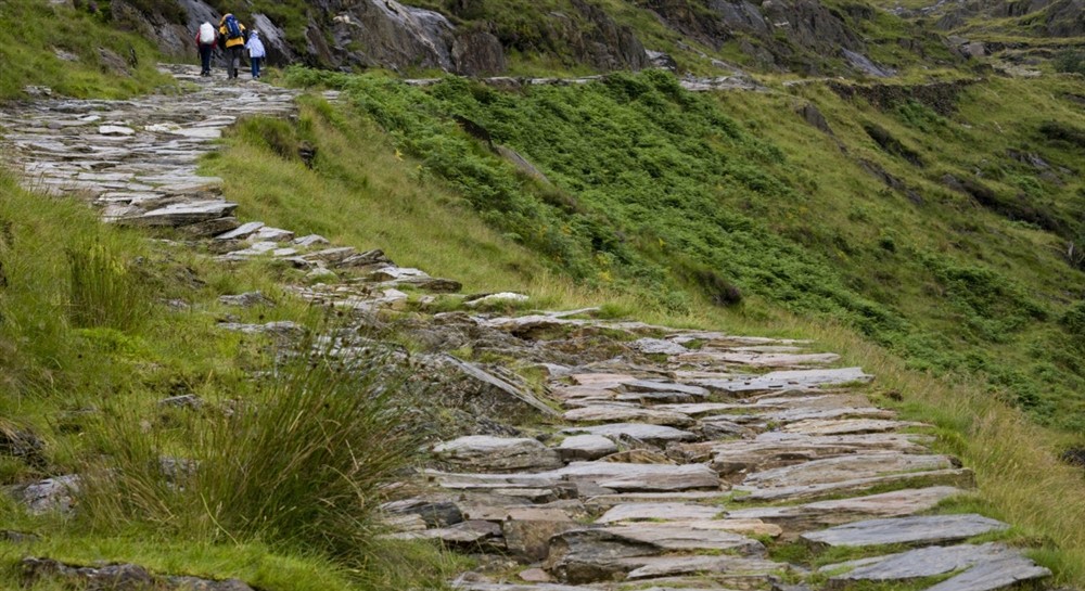 Walkers on the Watkin Path, Snowdonia at Y Wenallt in Beddgelert, North Wales