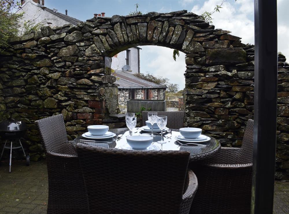 Patio (photo 2) at Yan Cottage in Broughton Beck, Cumbria