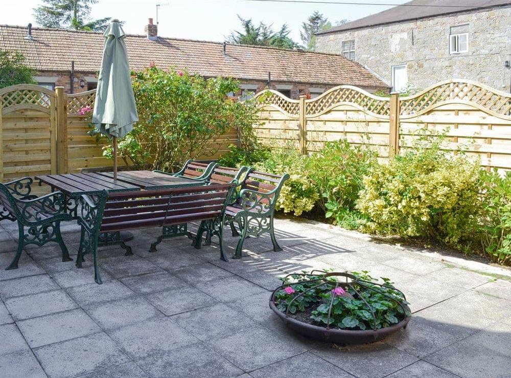 Enclosed patio and garden area at Yard End House in Killerby, Cayton, Nr Scarborough, North Yorkshire., Great Britain