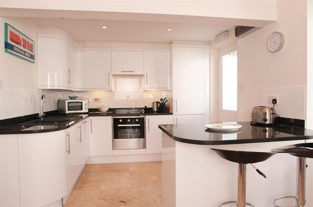 Modern well equipped kitchen at Yardarm in 42 Devon Road, Salcombe