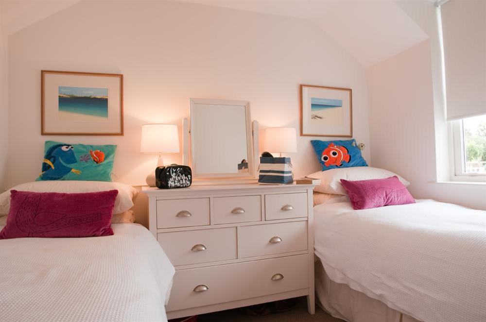 Second floor twin bedroom with 2ft 6" beds (suitable for children only) at Yardarm in 42 Devon Road, Salcombe