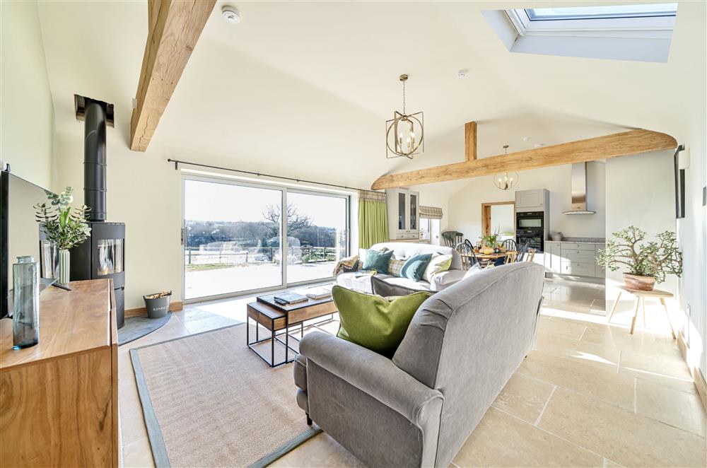 The Byre enjoys open-plan living, and a wood burning stove