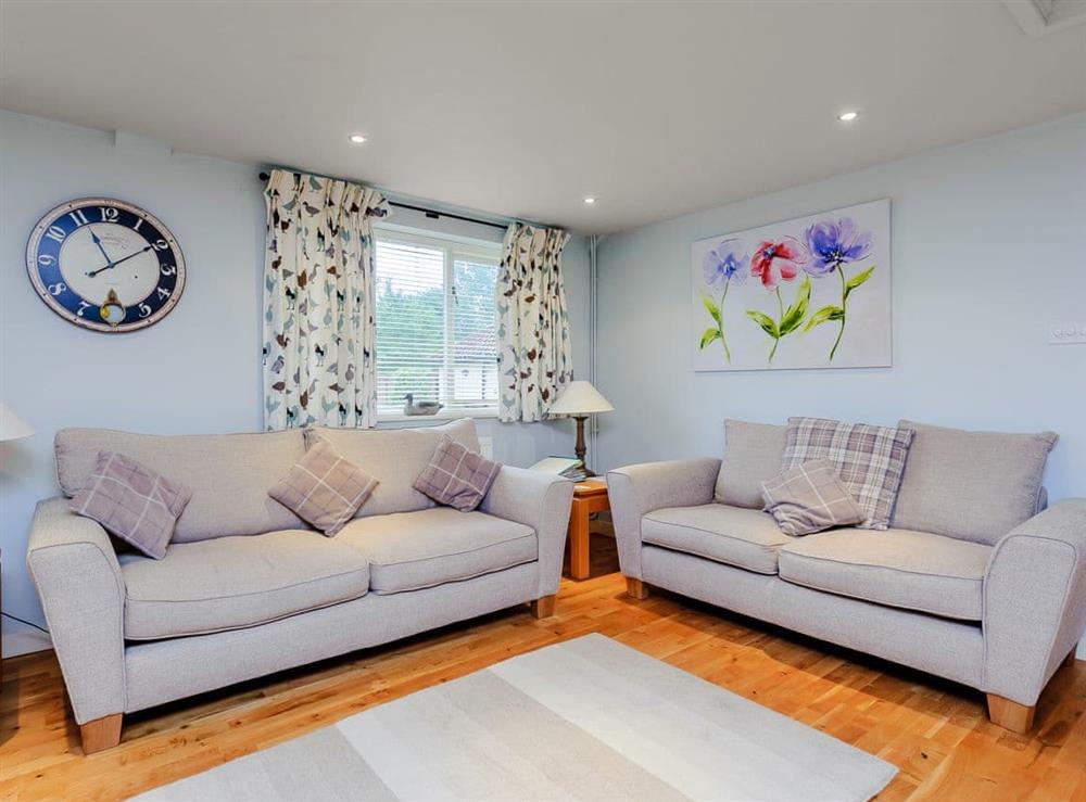 Comfortable living space at Coachmans Cottage, 