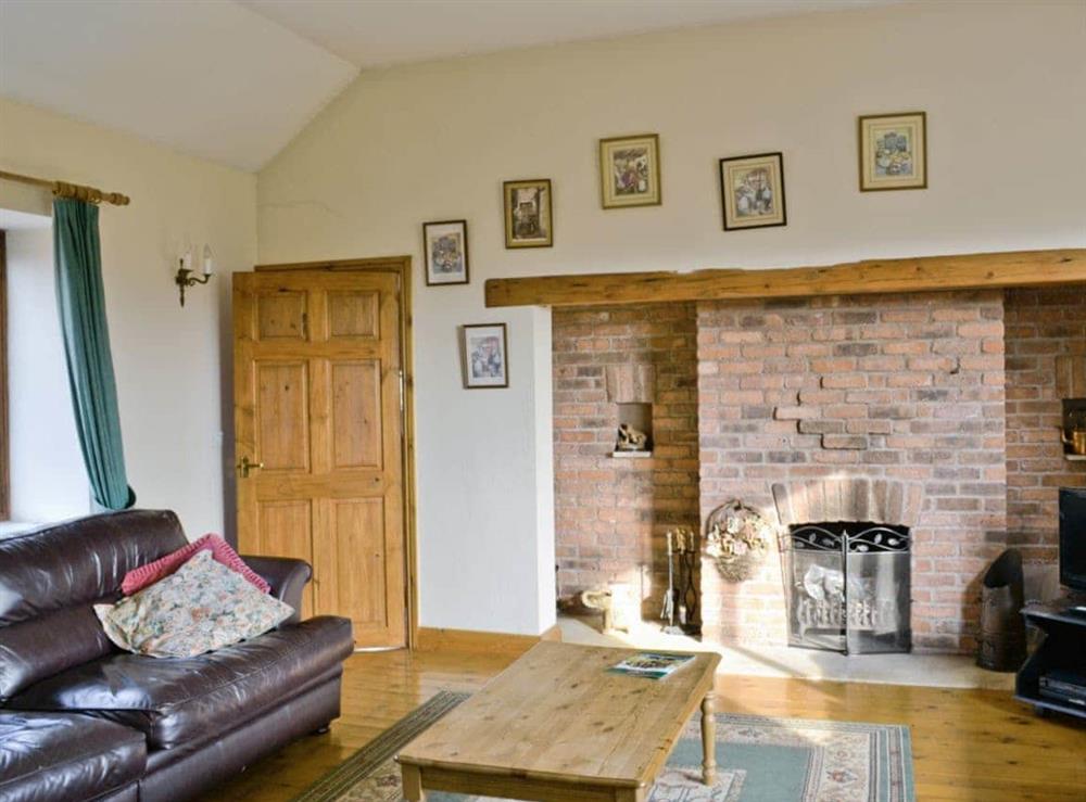 Living room at Ye Olde Smithy in Kennythorpe, Yorkshire Coast & Wolds