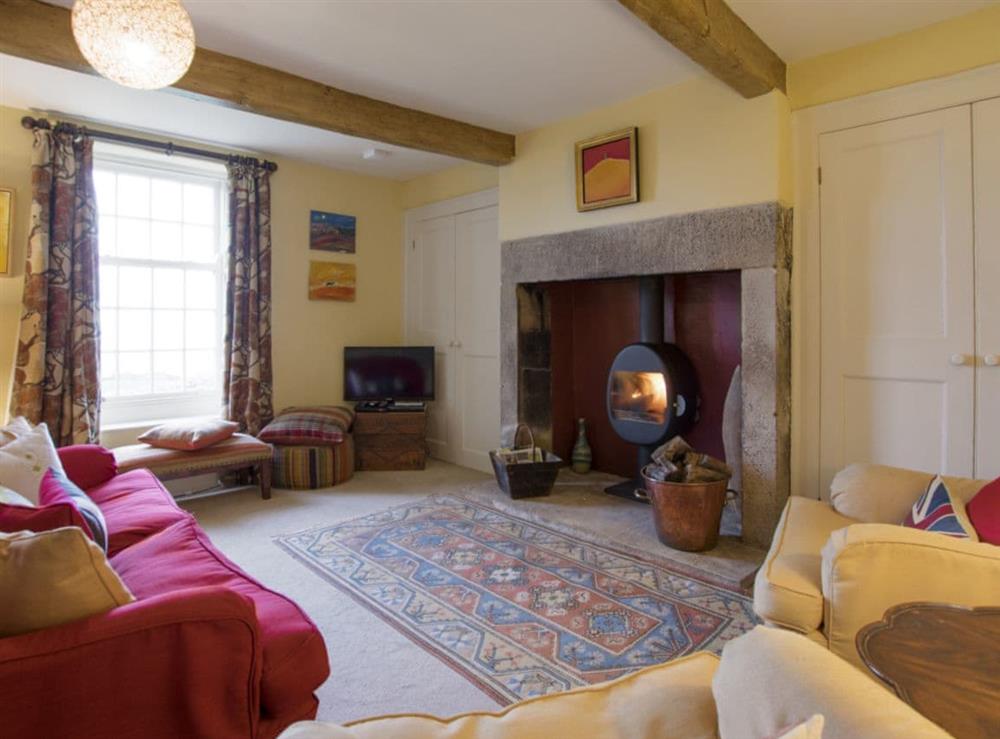 Charming living room with wood burner at Yellison in Broughton, near Skipton, North Yorkshire