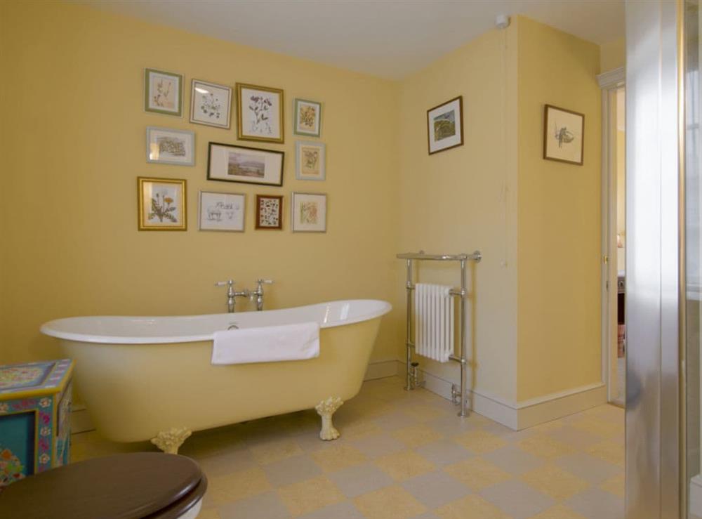 En-suite bathroom with shower cubicle and free standing bath at Yellison in Broughton, near Skipton, North Yorkshire