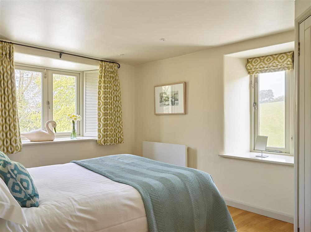 Bedroom one, with beautiful countryside views at Yennadon Cottage, Dartmouth
