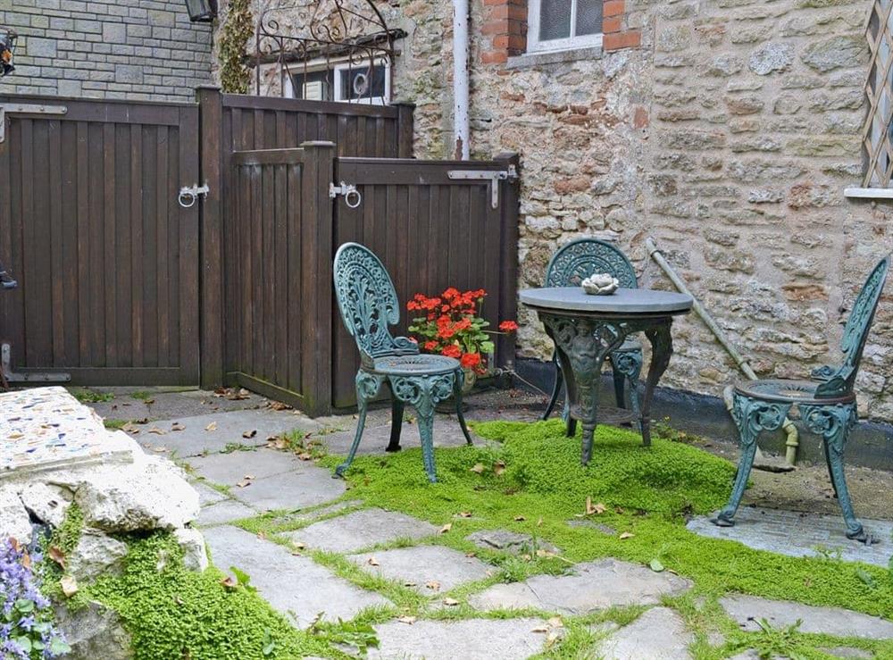 Small enclosed courtyard with patio
